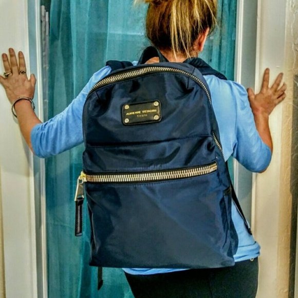 Adrienne Vittadini Handbags - Adrienne Vittadini navy nylon gold travel backpack